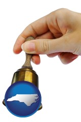 north-carolina map icon and a bell being rung for the maid or the butler